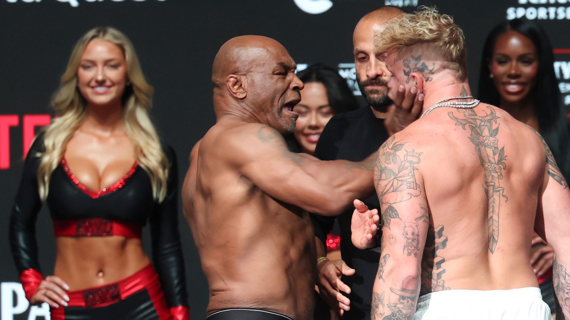 Iron Mike Tyson Slaps Jake Paul During Pre-Fight Weigh-In [WATCH]