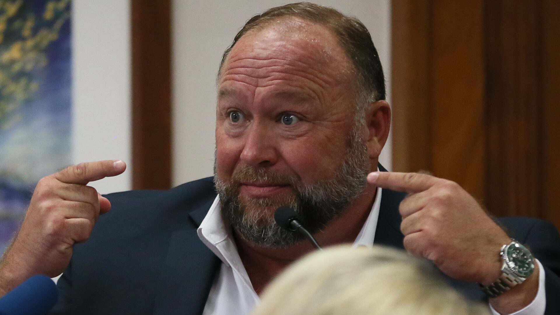 Alex Jones’ Remains in Charge for Now as Judge Blocks Infowars Sale